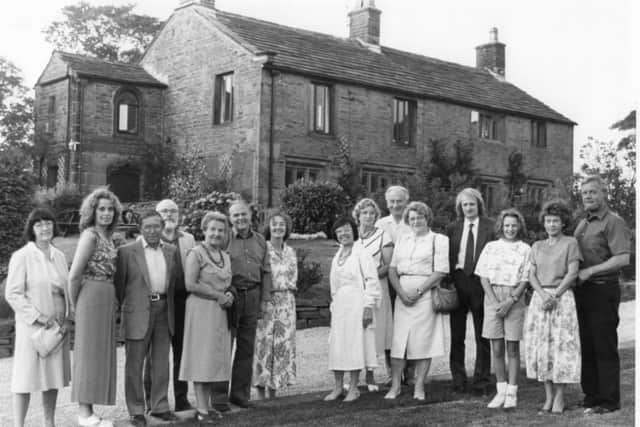 DOCTOR'S HOUSE: Members of the Briercliffe Society at Foulds House in September, 1991. The late Mr John and Mrs Penny Goodier, right, lived in the house at the time but the property had been the home of D. John Ecroyd, who treated patients for the Overseer of the Poor, in the 18th Century.