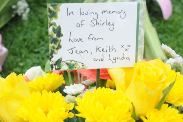 Floral tributes at Shirley Thorpe's funeral.