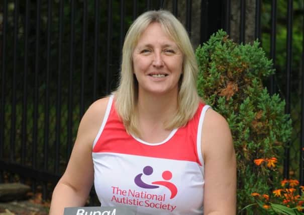Liz Allison is due to take part in the Great North Run and raise funds for National Autistic Society.