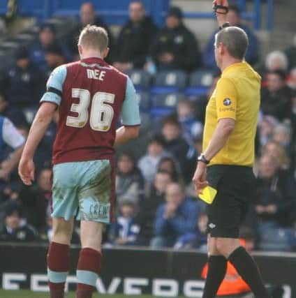 Ben Mee sees red following his second booking.