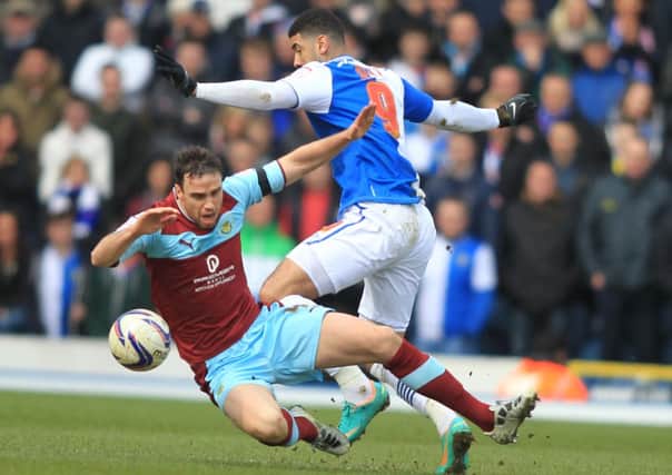 Old rivals: Michael Duff challenges Blackburns Leon Best in the 1-1 draw at Ewood Park last season