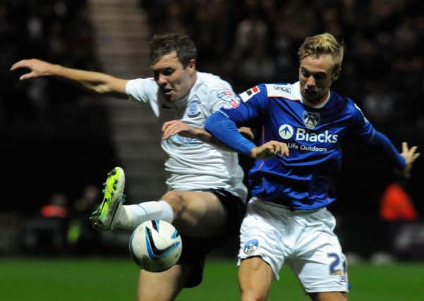 Joe Mills in action for Oldham at Deepdale on Monday night
