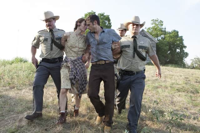 Rooney Mara as Ruth Guthrie and Casey Affleck as Bob Muldoon in Ain't Them Bodies Saints