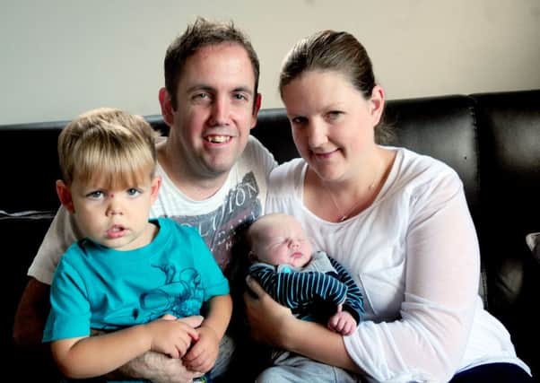 Paul and Helen Campbell with children Euan-Jai and Cohen.
Photo Ben Parsons
