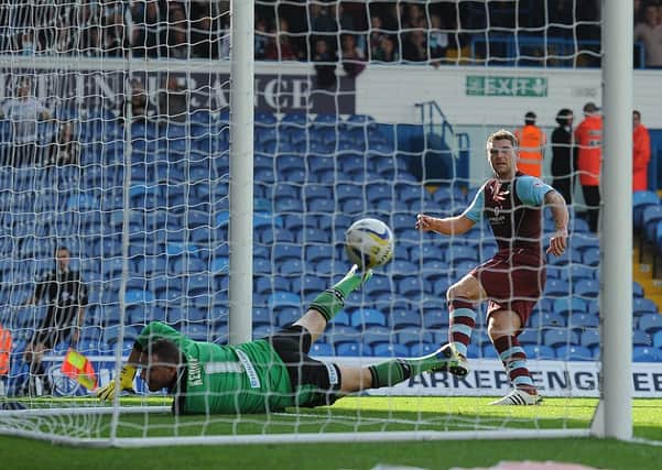 Big win: Sam Vokes whips the ball past Leeds United keeper Paddy Kenny to make it 2-0 on Saturday