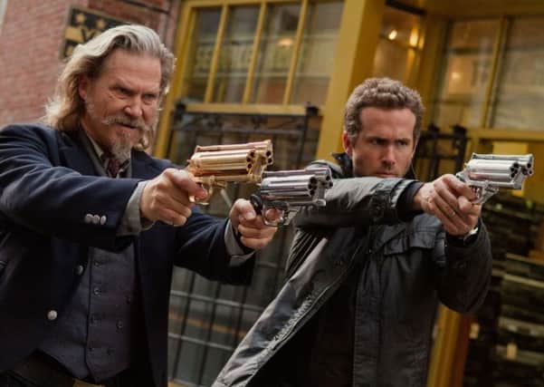 Undated Film Still Handout from R.I.P.D. Pictured: Jeff Bridges and Ryan Reynolds. See PA Feature FILM Film Reviews. Picture credit should read: PA Photo/UPI Media. WARNING: This picture must only be used to accompany PA Feature FILM Film Reviews.