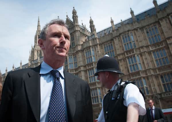 Deputy Speaker of the House of Commons and MP for Ribble Valley Nigel Evans prepares to make a statement in Westminsterabout his arrest. Photo: Stefan Rousseau/PA Wire