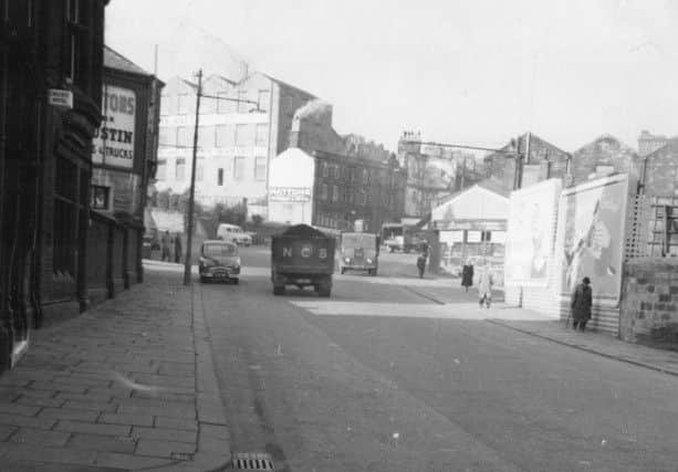 Though the name is not used much these days, this is the Bridge End area of Burnley. Rather than use Westgate, which is a product of the turnpike era, the road continued up Sandygate, which is to the left in this picture, where the Austin A30 van appears to be parked.