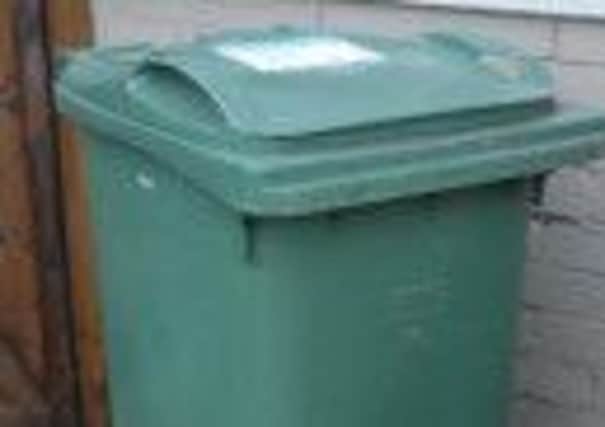 Green wheely bin