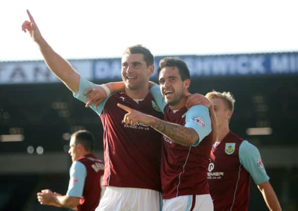 Sam Vokes celebrates his first goal against Charlton with Danny Ings.