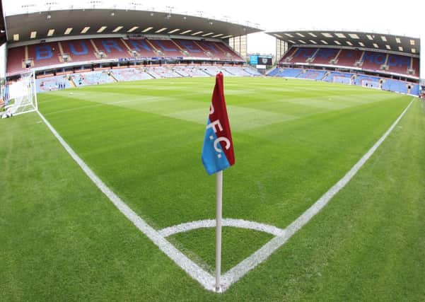 The game takes place at Turf Moor on Tuesday, October 8th at 7pm