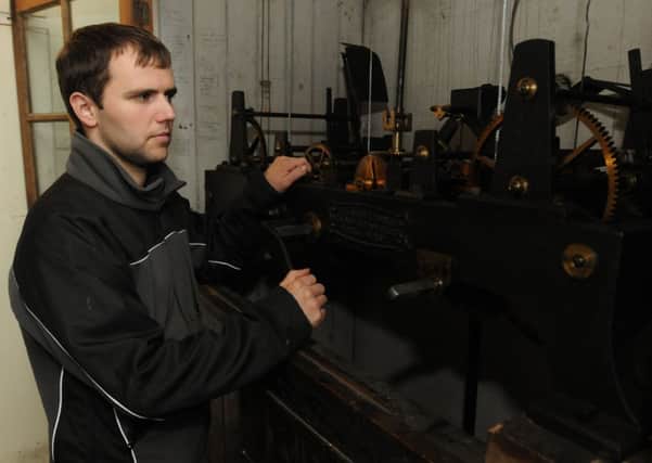 Clockmaker Matthew Warburton who has restored the chime on the St Nicholas Church clock after two years.