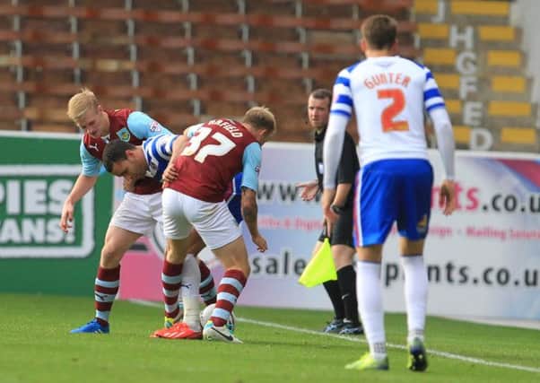 Pressing matter: Ben Mee and Scott Arfield deny Reading any space to attack in Saturdays 2-1 win at Turf Moor