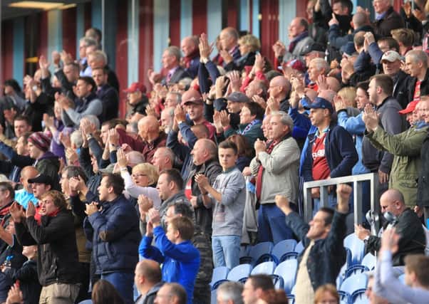 One-club mentality: Clarets boss Sean Dyche feels Burnleys form, in the face of a lack of finances, has brought everyone together