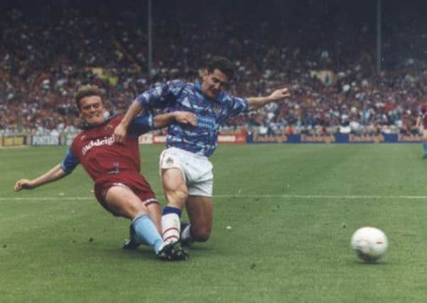 WEMBLEY HERO: Gary Parkinson in action against Stockport at Wembley in 1994