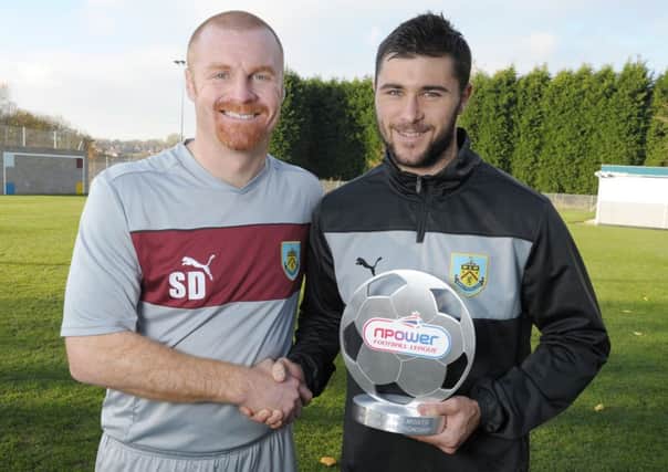 BACK IN TOWN: Former Clarets striker Charlie Austin with Sean Dyche