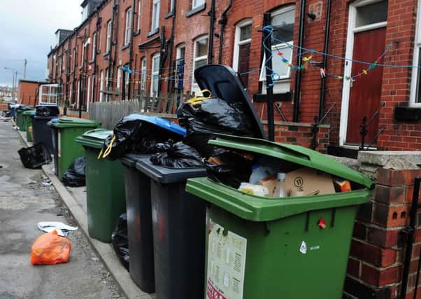 Bags of rubbish and overflowing bins. Photo: Anna Gowthorpe/PA Wire