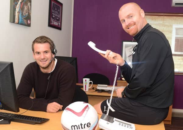 Tom Heaton and Sean Dyche making calls at the new centre