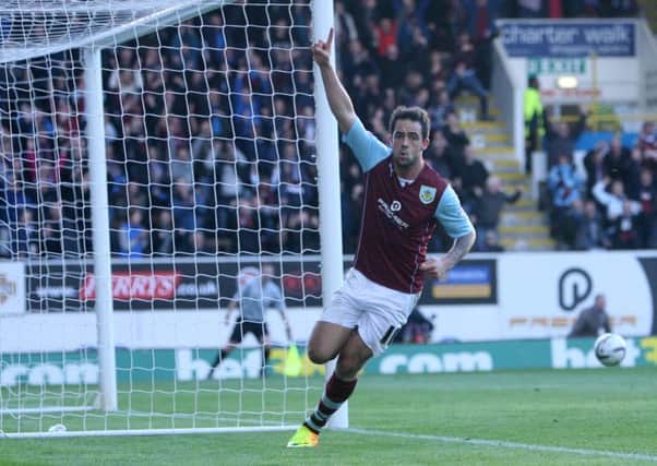 Opener: Danny Ings celebrates his first goal.