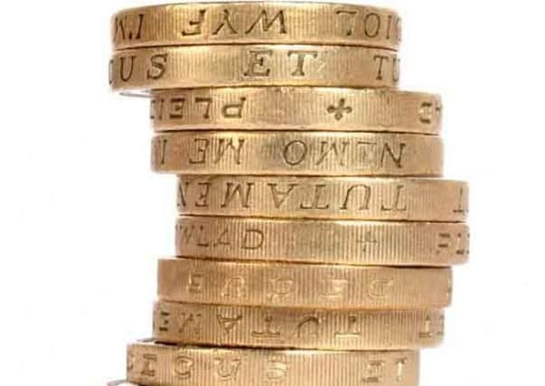 A stack of pound coins.