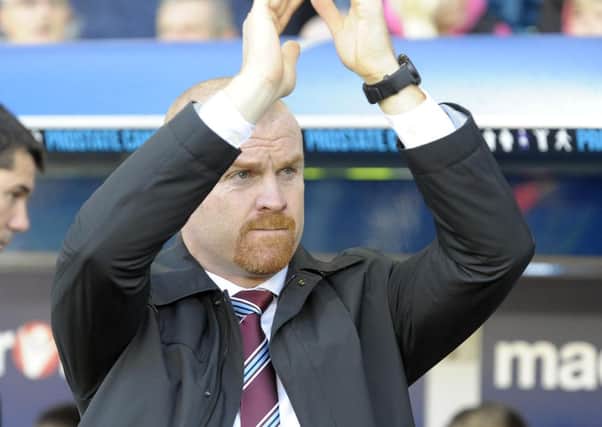 HAPPY BOSS: Sean Dyche acknowledges the travelling Burnley fans after salvaging a point at Millwall on Saturday