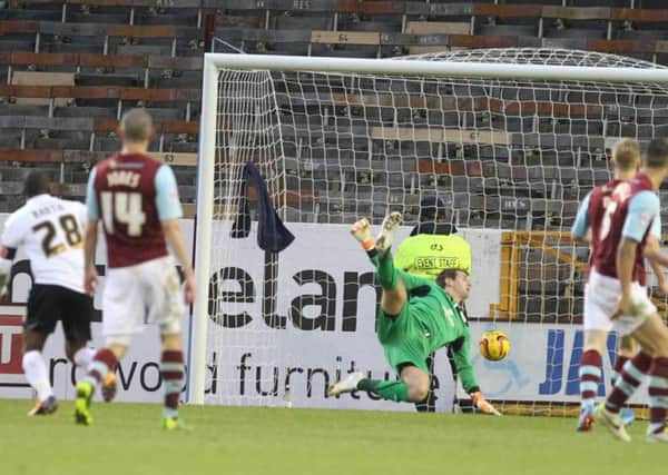 Clarets keeper Tom Heaton is beaten by a wonder strike from Bournemouths Tokelo Rantie on Saturday