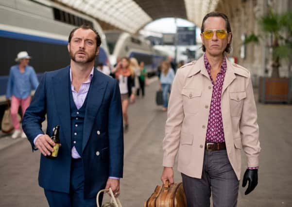 Undated Film Still Handout from Dom Hemingway.  Pictured: l-r Jude Law, Richard E Grant.  See PA Feature FILM Film Reviews. Picture credit should read: PA Photo/Lionsgate publicity. WARNING: This picture must only be used to accompany PA Feature FILM Film Reviews.