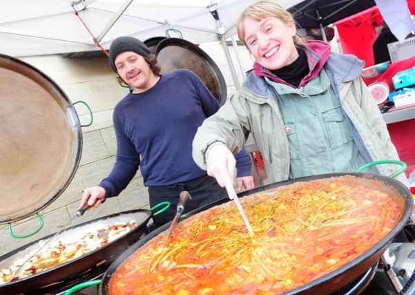 PAELLA: Lee and Steph on their Las Paelleras stall at the Colne Food Festival.
Photo Ben Parsons