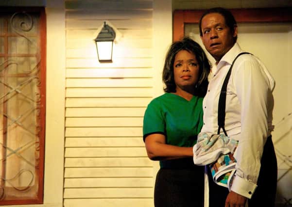 This film image released by The Weinstein Company shows Oprah Winfrey as Gloria Gaines, left, and Forest Whitaker as Cecil Gaines in a scene from "Lee Daniels' The Butler." (AP Photo/The Weinstein Company, Anne Marie Fox) ORG XMIT: NYET138