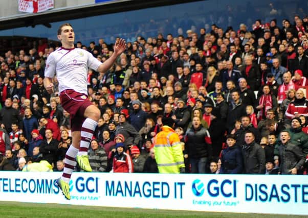 Sam Vokes celebrates putting the Clarets ahead from the spot