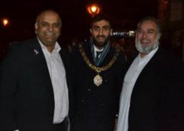 County Coun. Azhar Ali, Mayor of Brierfield Coun. Qamar Shazad and organiser Coun. Mohammed Hanif at the Brierfield Christmas lights turn on(S)