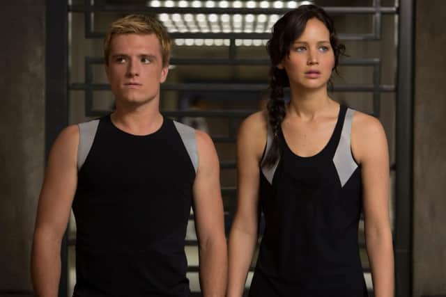 Undated Film Still Handout from The Hunger Games: Catching Fire. Pictured: Jennifer Lawrence, Josh  Hutcherson. See PA Feature FILM Film Reviews.  Picture credit should read: PA Photo/Lionsgate Publicity. WARNING: This picture must only be used to accompany PA Feature FILM Film Reviews.