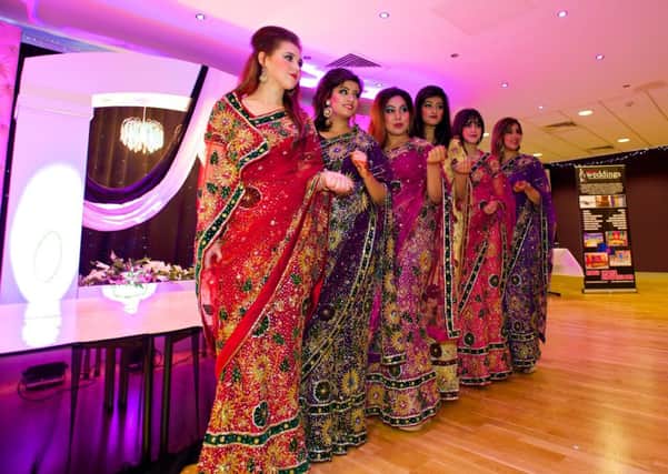 Asian Wedding Show, ACE Centre. Models show off traditional dress available at the show.