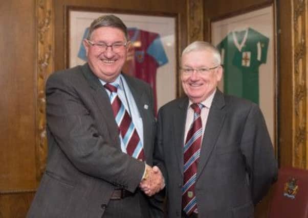 Brian is pictured being welcomed onto the Board by the clubs longest serving Director, Mr Clive Holt