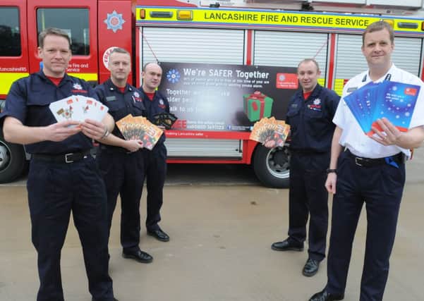 Fire-fighters from white-watch Kieron Dobson, crew manager Dave Robinson, Simon Wright, Nick Pettigrew and station manager Steve Morgan at the launch of the 'Safer Together' community campaign.