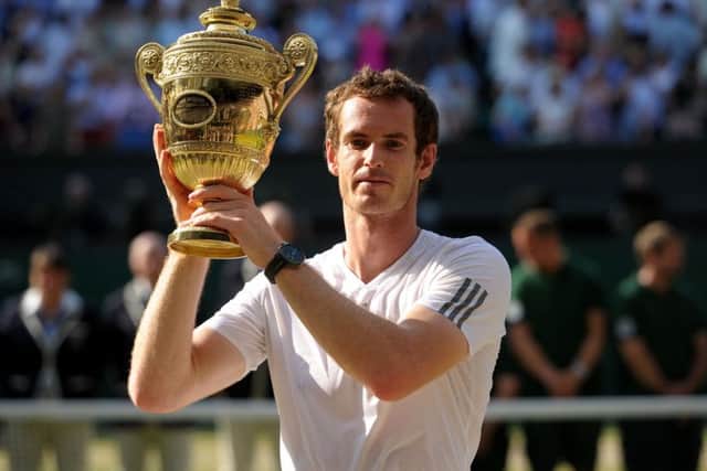 Great Britain's Andy Murray with the Wimbledon trophy. Photo: Adam Davy/PA Wire.