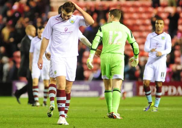 Burnley's Sam Vokes looks dejected at the final whistle. 

Photo by Chris Vaughan/CameraSport

Football