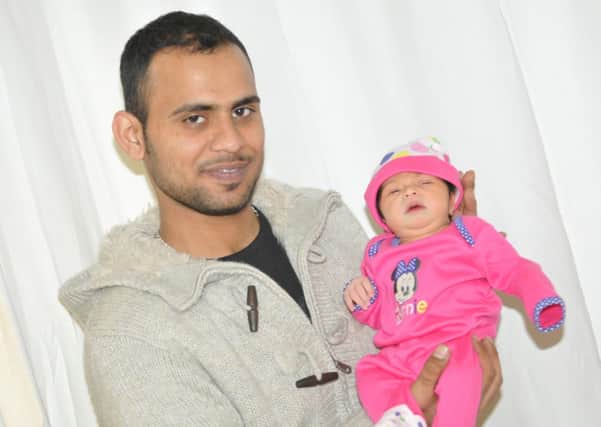 Proud dad Muhammed Rizwan  with daughter Aemaan Noor.