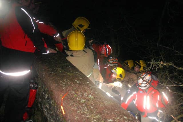 Emergency services raise the victim up to the canal towpath. Photo: Peter Dewhurst