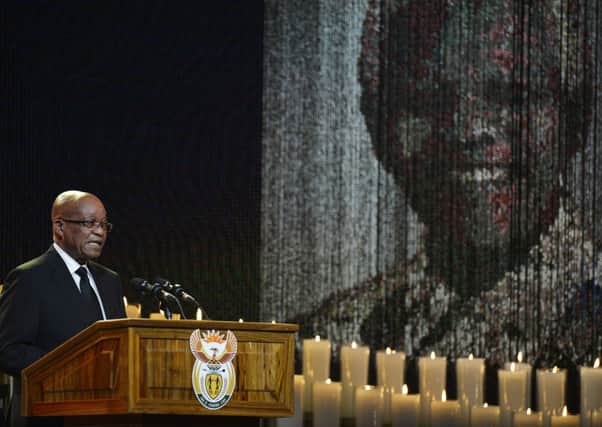 South Africa President Jacob Zuma speaks during the funeral service for former South African President Nelson Mandela in Qunu, South Africa. (AP Photo/Odd Andersen, Pool)