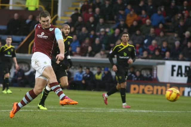Sam Vokes fires Burnley into the lead.