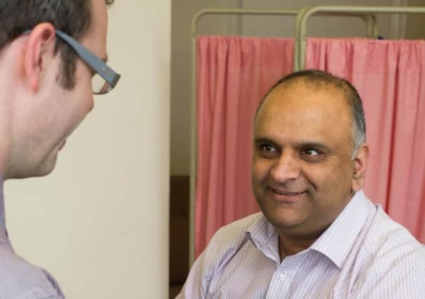 Lancashire County Councillor Azhar Ali undergoes his free health check. (s)