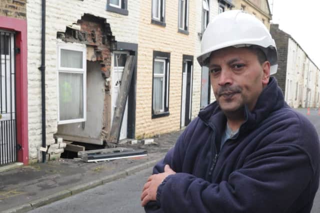 John Rhodes who lives next door to the collapsed house on Herbert Street.