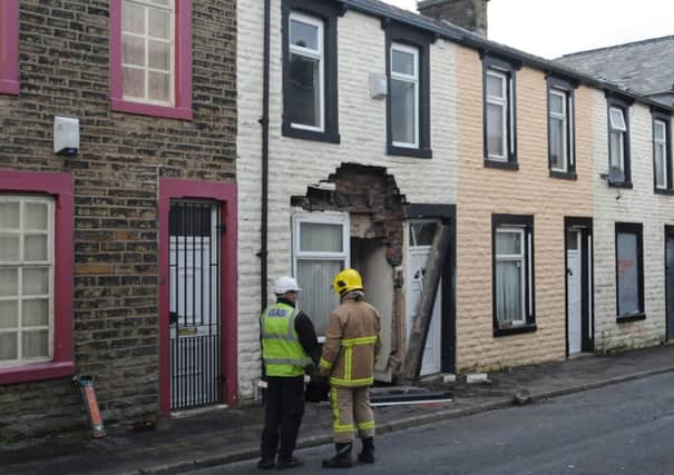 Scene of the collapsed house on Herbert Street.