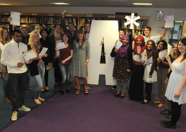 Nelson & Colne College students celebrate with their A-Level results.