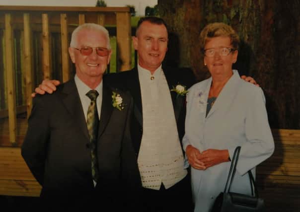 David Blackburn is desperately trying to return his mum home to Foulridge. David is pictured with his mum, Doreen and his dad, Maurice.