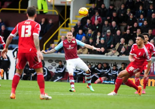 BURNLEY V FOREST: Kightley has an effort from distance.
Photo Ben Parsons