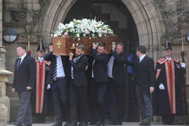Thousands of people gathered to say their last goodbyes to one of the greatest footballers of all time. 
Pictured are the coffin bearers with Tom Finneys coffin

rossparry.co.uk / Thomas Temple