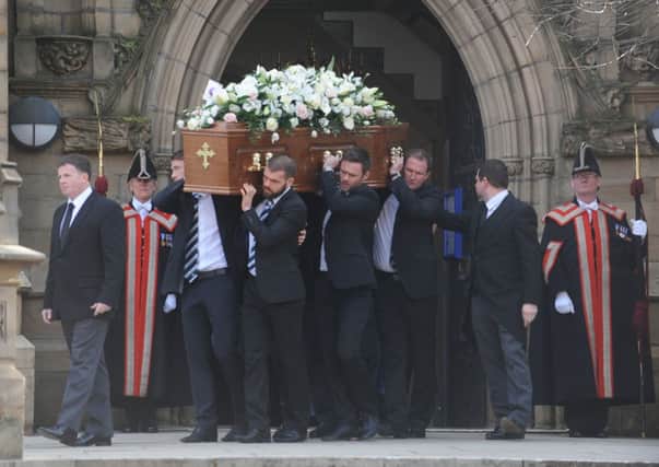 Thousands of people gathered to say their last goodbyes to one of the greatest footballers of all time. 
Pictured are the coffin bearers with Tom Finneys coffin

rossparry.co.uk / Thomas Temple