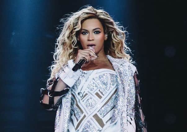 Beyonce performs onstage on her  "Mrs. Carter Show World Tour 2014".  (Photo by Robin Harper/Invision for Parkwood Entertainment/AP Images)